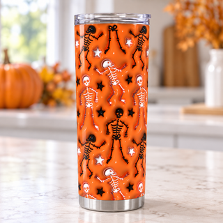 Dancing skeletons on orange — one tumbler in kitchen setting