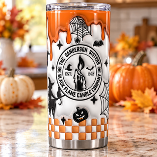 Witch Candle: white-orange — one tumbler in kitchen setting