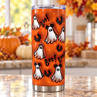 Ghosts, bats and Boo on orange — one tumbler in kitchen setting