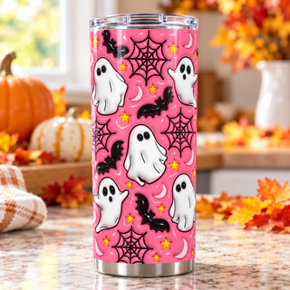 White ghosts, bats and webs on pink — one tumbler in kitchen setting