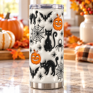 Black cats, jack-o-lanterns and webs on white — one tumbler in kitchen setting