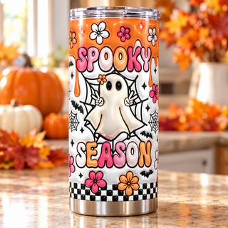 Spooky Season: ghost, flowers and orange drips — one tumbler in kitchen setting