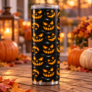 Orange jack-o-lantern faces on black — single tumbler on autumn porch