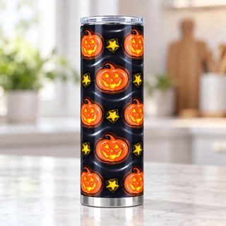 Jack-o-lanterns and stars on black — single tumbler on kitchen counter