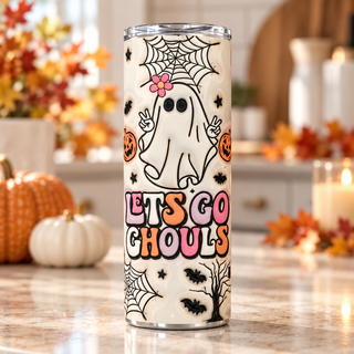 Lets Go Ghouls: ghost, pumpkins and webs — one 20 oz skinny stainless steel tumbler in a kitchen lifestyle mockup