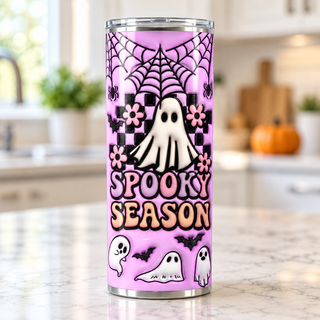 Spooky Season: ghosts and checkerboard on purple — single tumbler in a kitchen setting